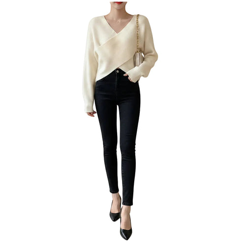 Women's loose fit knit sweater in Black back view